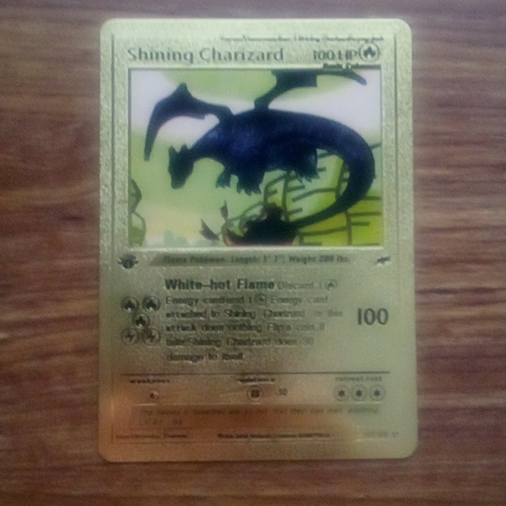 1st edition Shining Charizard gold foil
